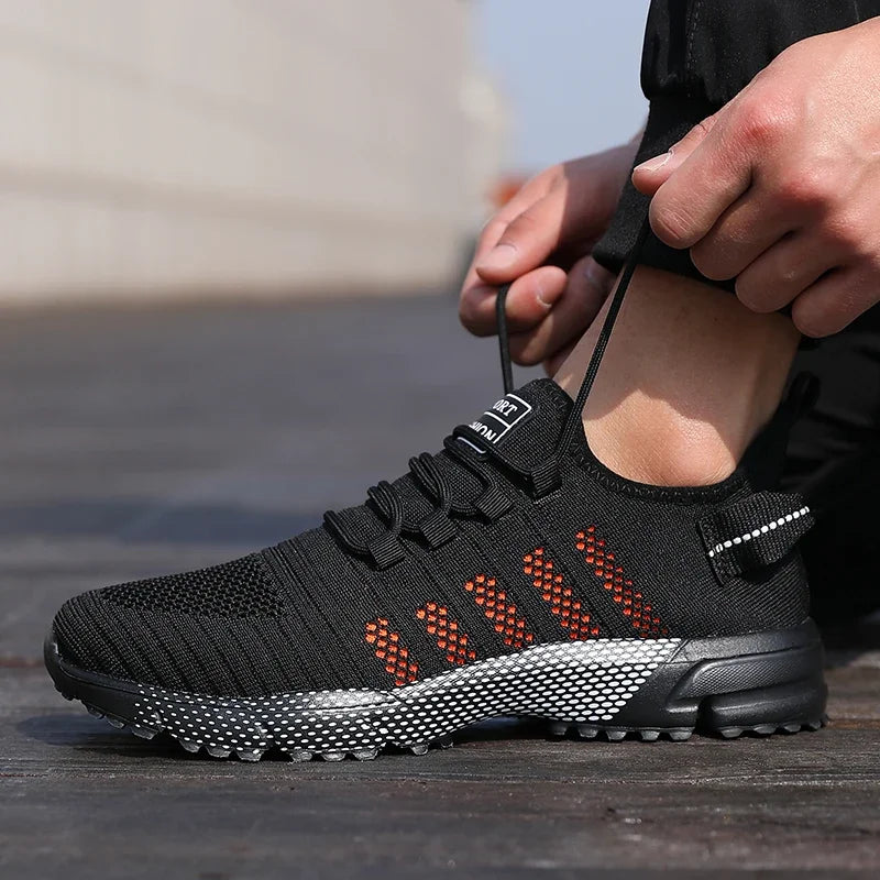 Lediga sneakers för män i mesh, lätta och ventilerande, med mjuk sula – slip-on-löparskor, låga loafers och träningsskor för män